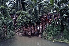 1975 Bangladesh. Villagers greet the team