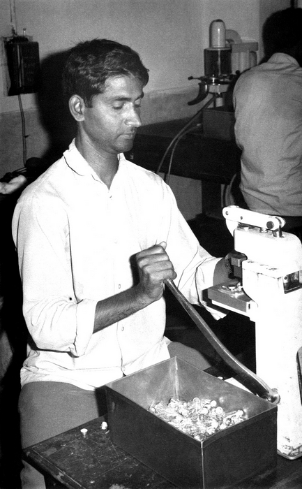 early 1970s Bangladesh. Capping vials